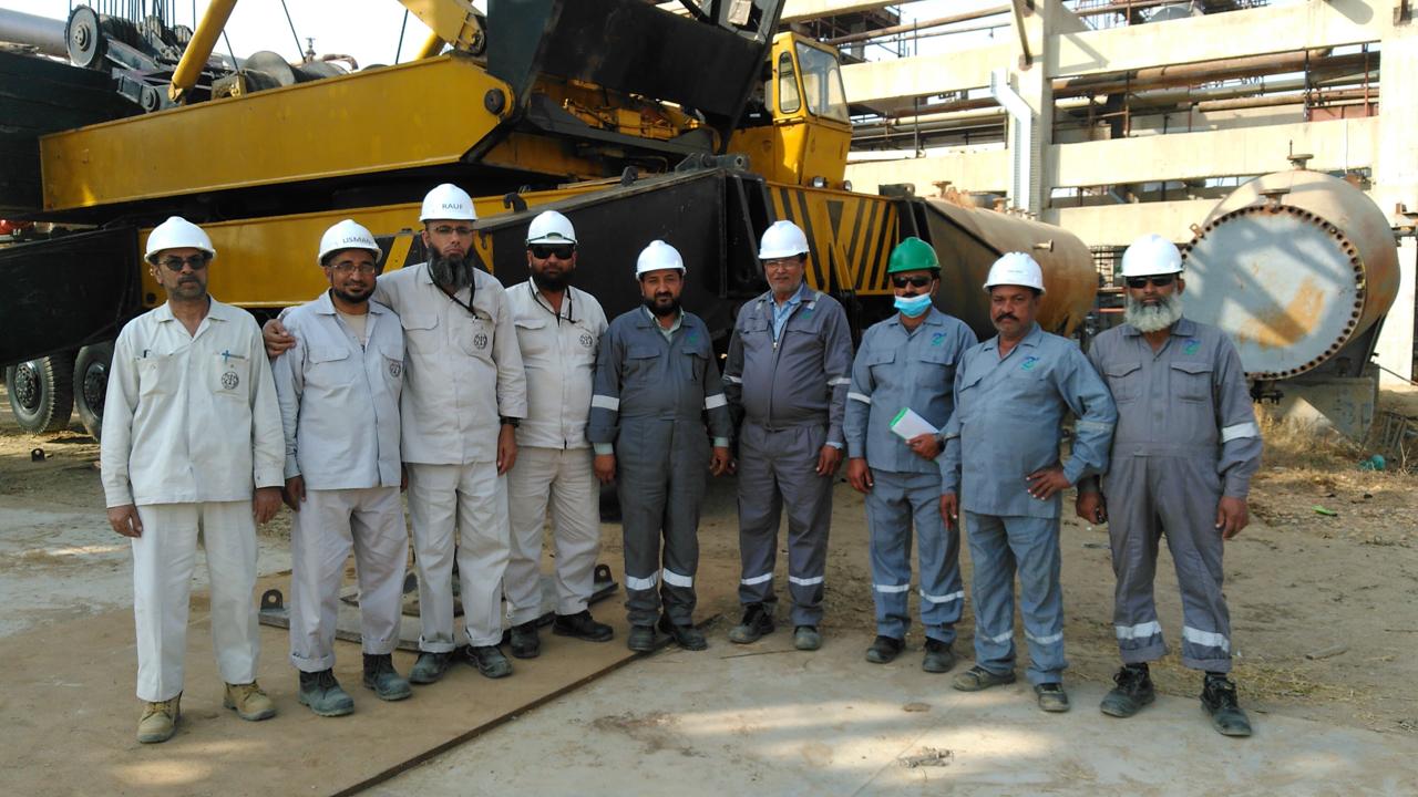 MEEC trade team assembled at a plant work front